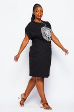 gold pin black dress